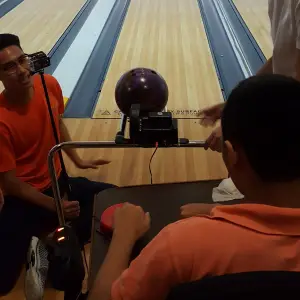 Assistive technology device by Engineering Good, which makes bowling accessible to persons with disabilities.